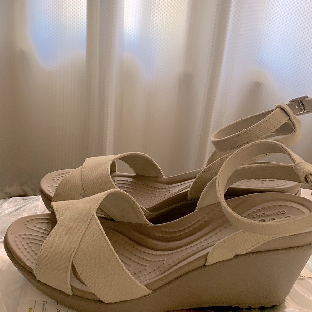Crocs Women's Leigh II Ankle Strap Wedge. Oatmeal/khaki. Dual comfort technology